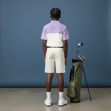 HARG Junior Comfort Fit Golf Polo in Royal Purple and Chalk White, breathable performance fabric, designed for movement.